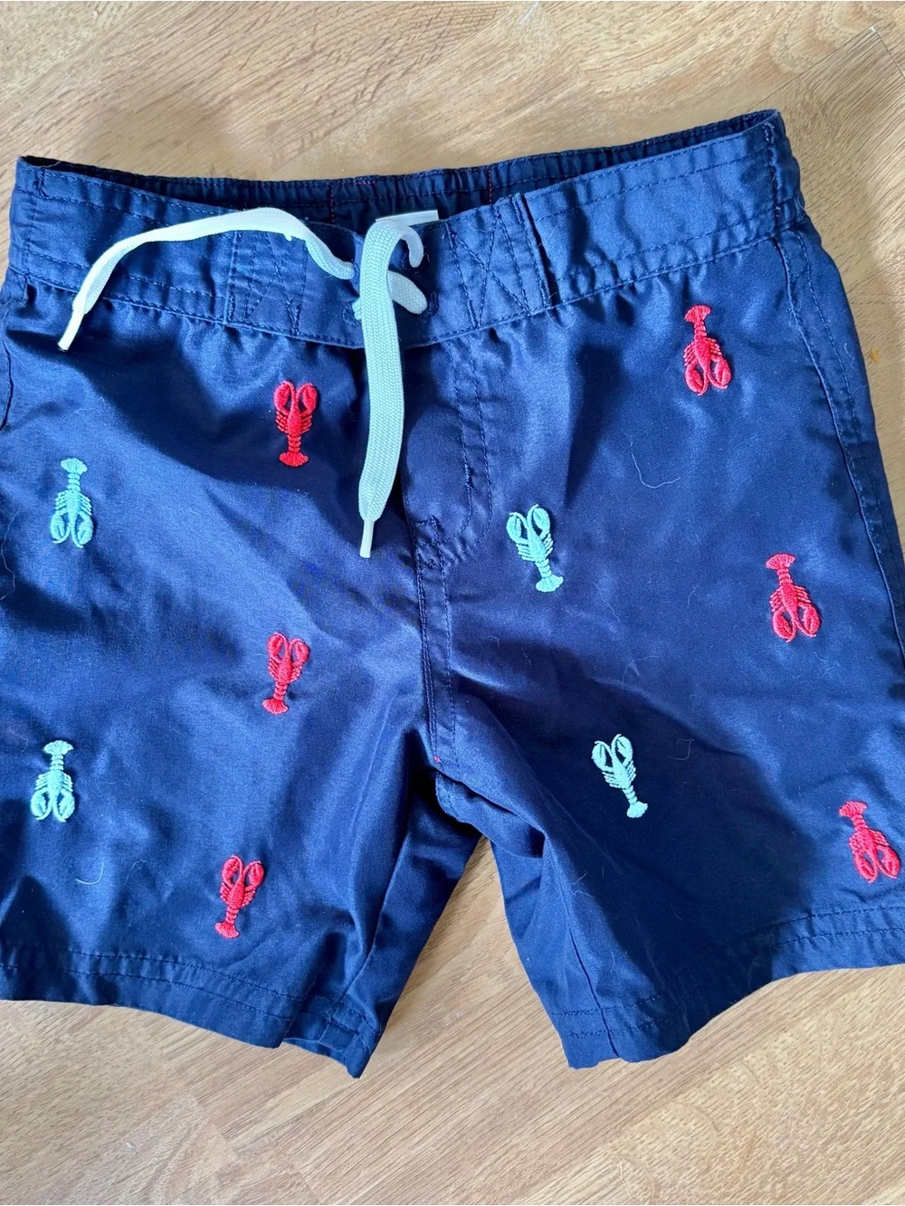 Janie and Jack toddler boys Navy blue swim shorts w lobster design, Sz 18/24M